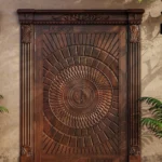 LK 128 solid wood double main door with a large carved mandala across both leaves and fluted pilasters, by LK Doors and Interiors
