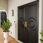 LK 723-H black HDHMR double door with raised circle panels and gold handles, by LK Doors and Interiors