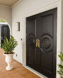 LK 723-H black HDHMR double door with raised circle panels and gold handles, by LK Doors and Interiors